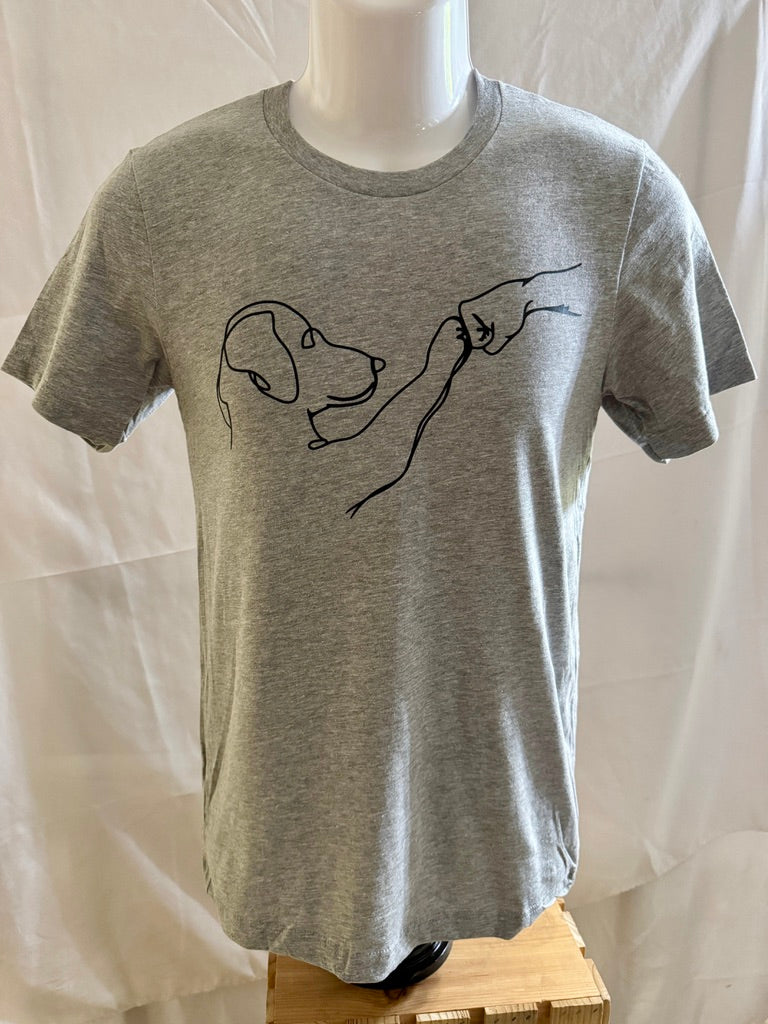a white t-shirt with a black outline of a dog and human touching fists