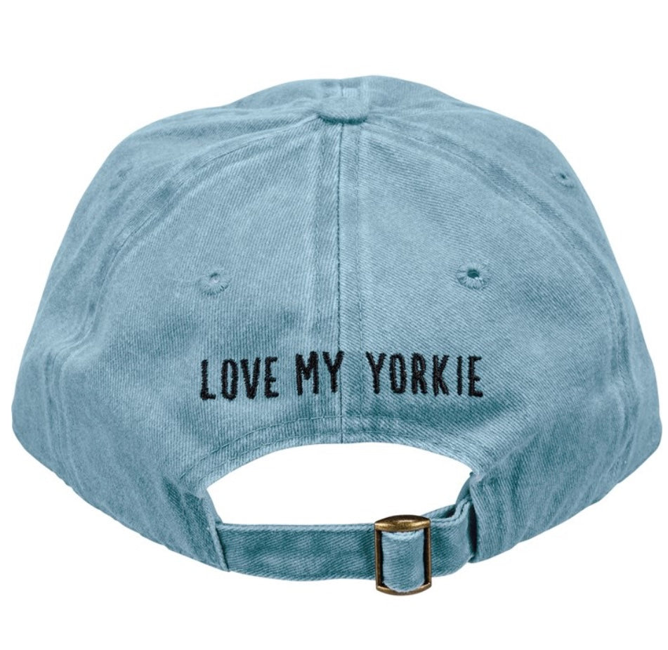 a blue baseball cap with "Love My Yorkie" on the back