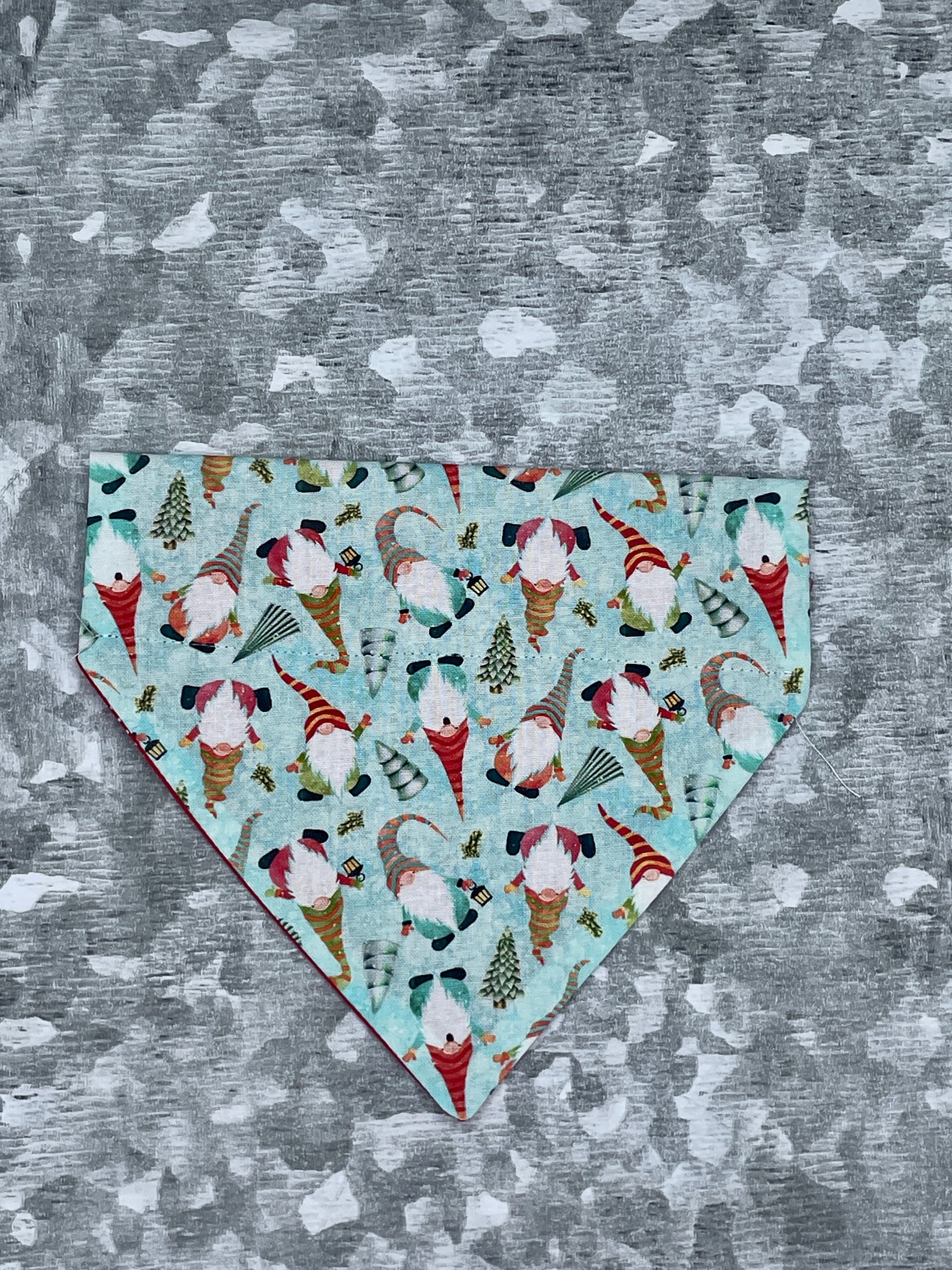a blue dog bandanna with Christmas Gnomes