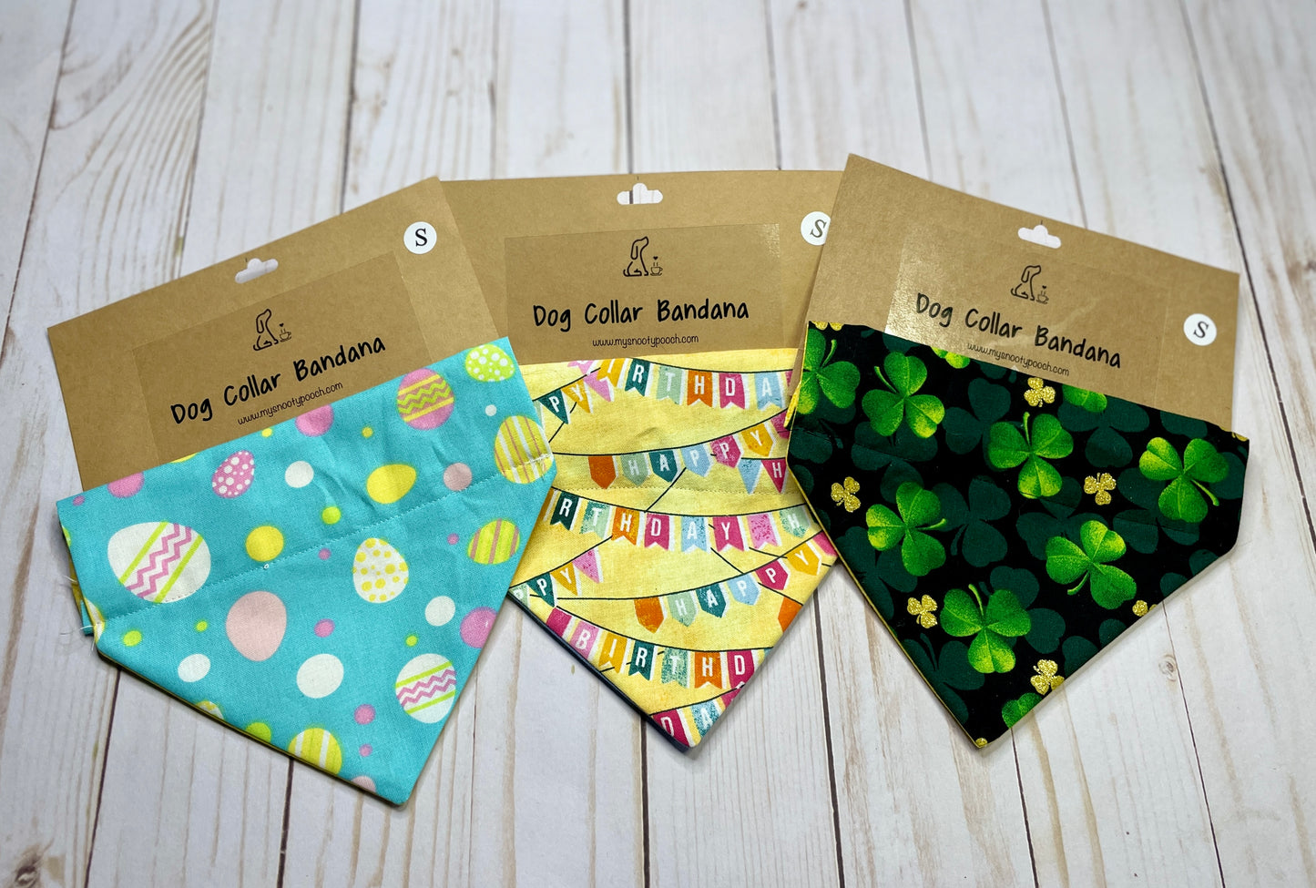 Three dog bandannas in an easter, happy birthday, and clover pattern